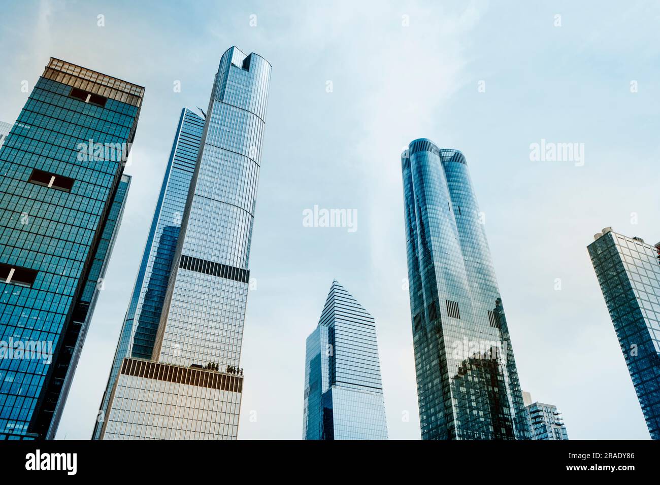 New York City, United States - May 19, 2023: Detail of the top section of some skyscrapers at Hudson Yards, in Midtown Manhattan, New York City Stock Photo