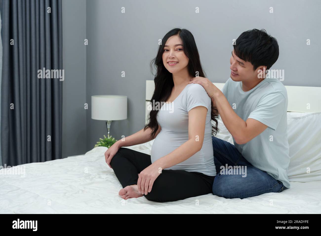 Woman giving massage husband hi-res stock photography and images - Alamy