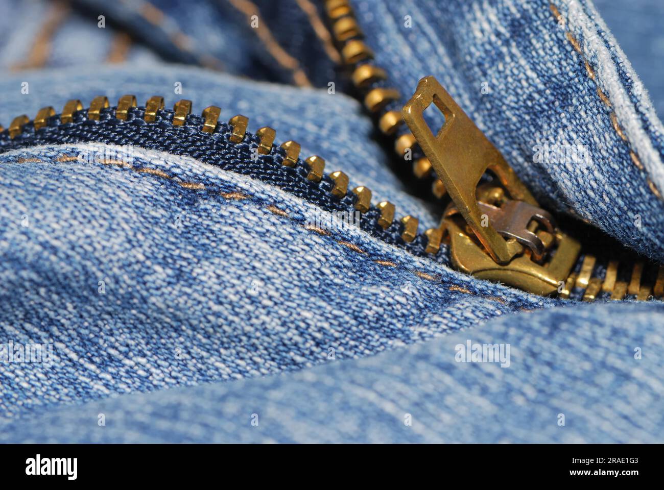 Half open zipper of a blue jeans Stock Photo - Alamy
