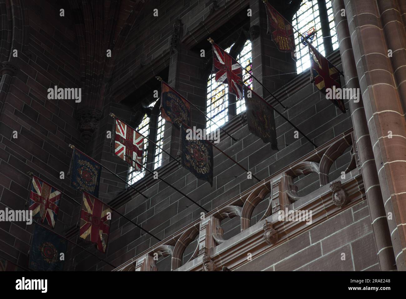 Viewed here is The Regimental Flags of the four UK military services, internal aspects related to Liverpool Anglican Cathedral. Stock Photo