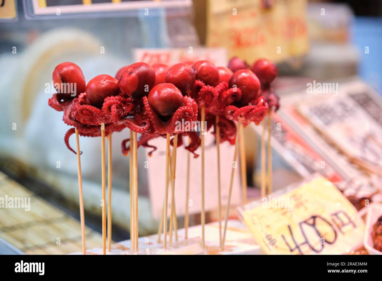 Tako tamago, baby octopus, simmered and glazed in soy sauce, with a