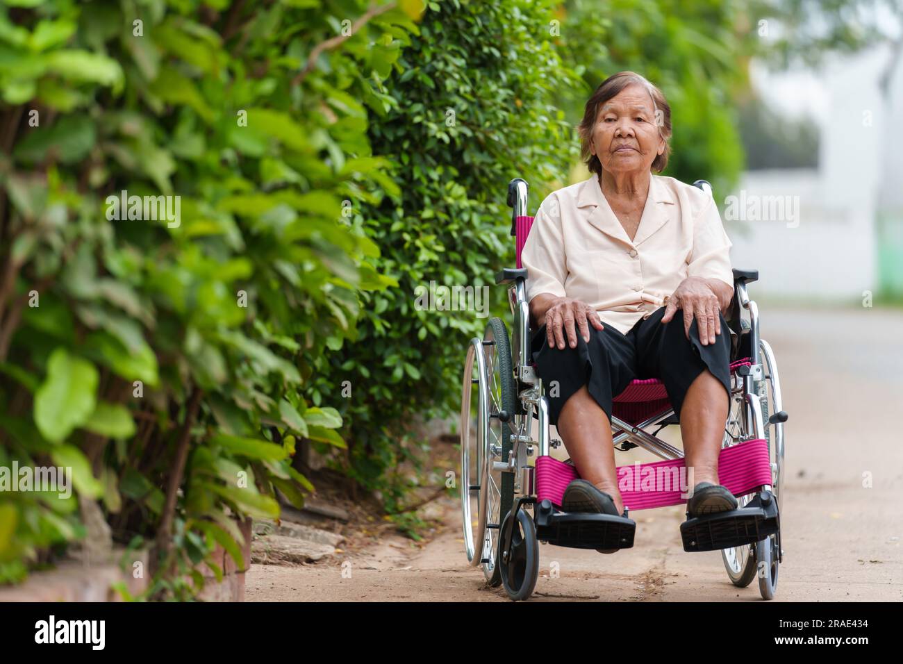 Old lonely woman in wheelchair hi-res stock photography and images - Alamy