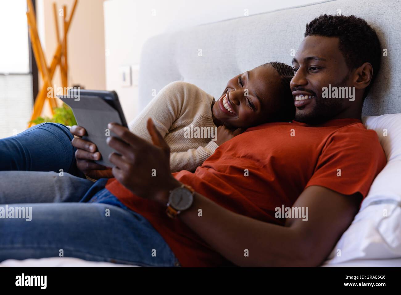 African american couple in bed hi-res stock photography and images - Alamy