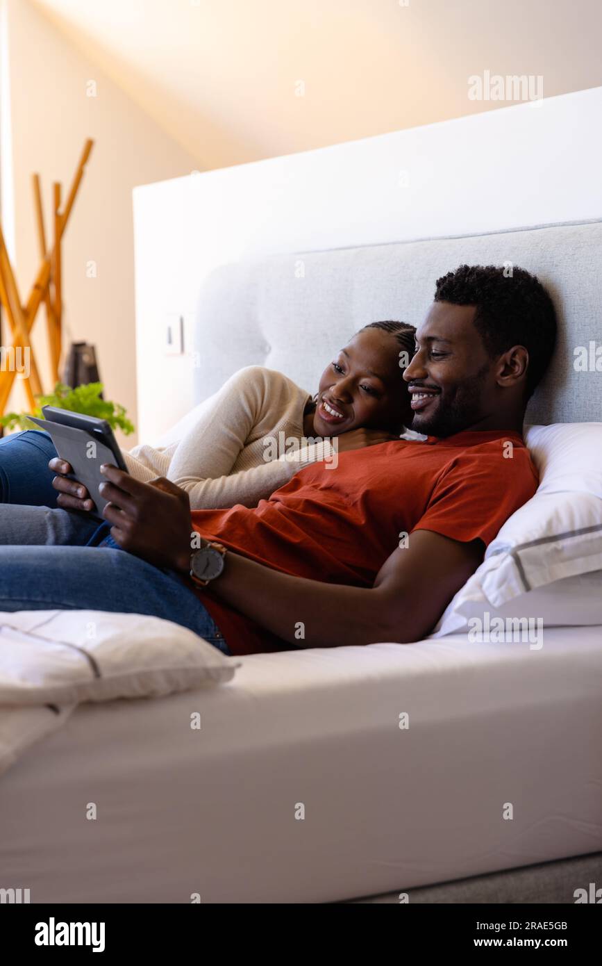 Happy african american couple lying hi-res stock photography and images ...