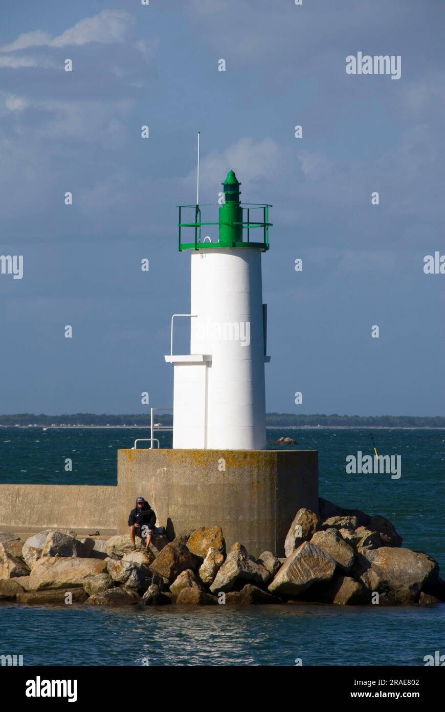 Lighthouse at harbour entrance, Haliguen harbour, Quiberon peninsula, Cote Sauvage, Morbihan, Brittany, France Stock Photo