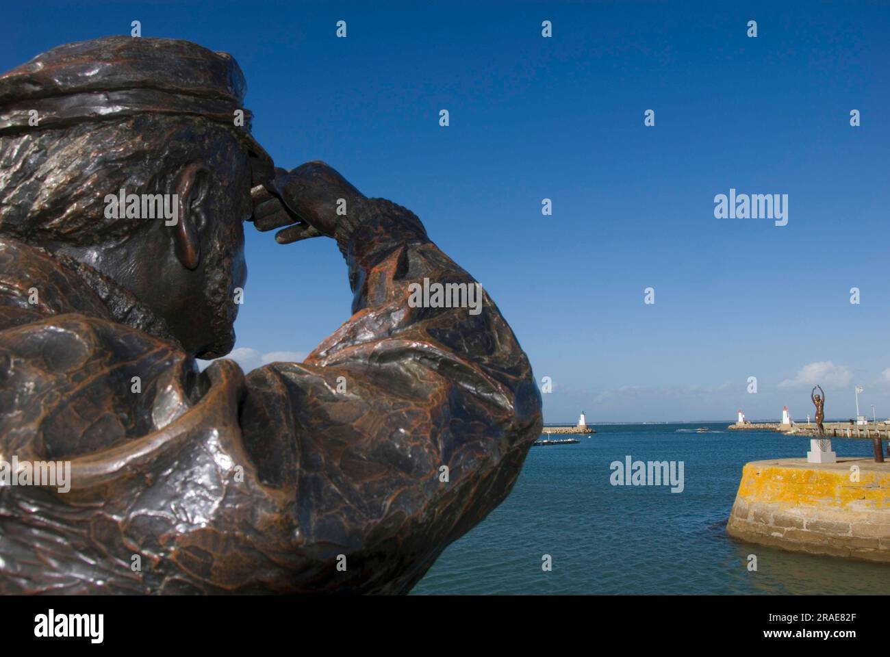 Angler statue in the harbour, Haliguen harbour, Penisula Quiberon, Cote Sauvage, Morbihan, Brittany, France Stock Photo