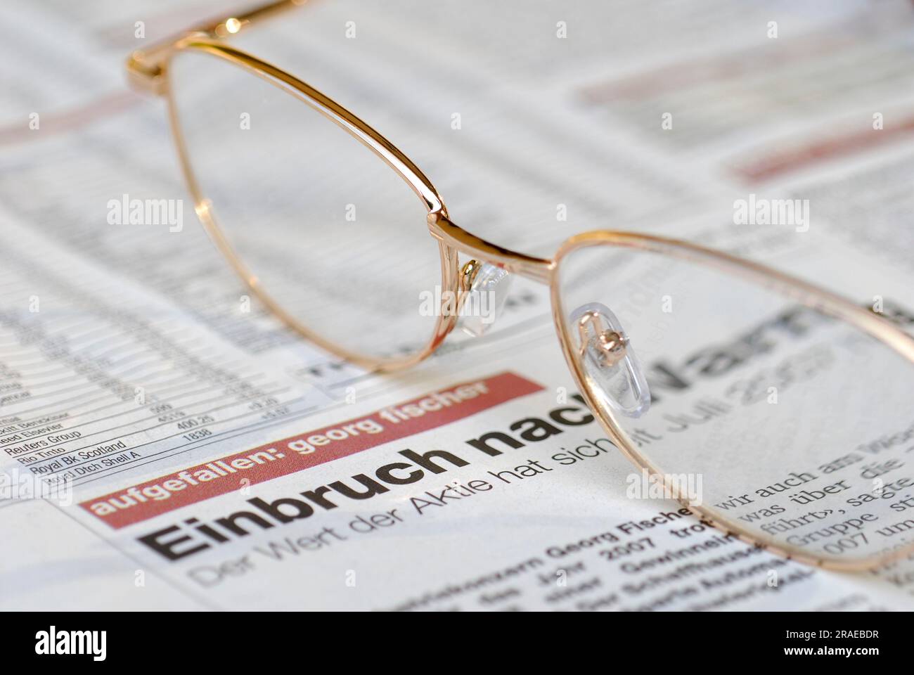 Glasses and newspaper, reading glasses, low vision Stock Photo Alamy