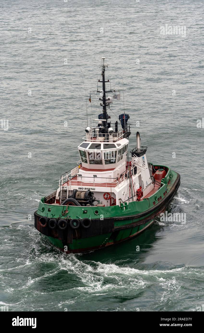 Cobh, Ireland, EU.  9 June 2023.  Alex an escort tug underway on Cobh Harbour Stock Photo