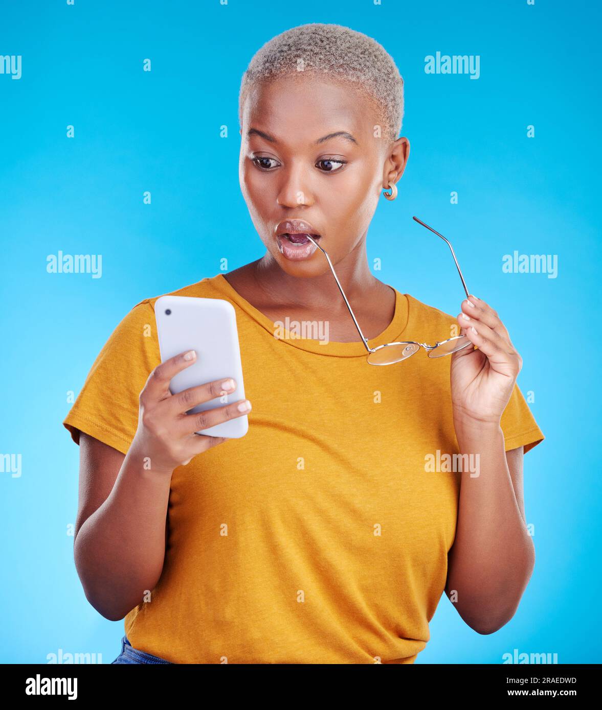 Shocked, wow and woman reading phone for fake news, wrong email and mistake or scam email. Surprise, stress and african person or online user, social Stock Photo