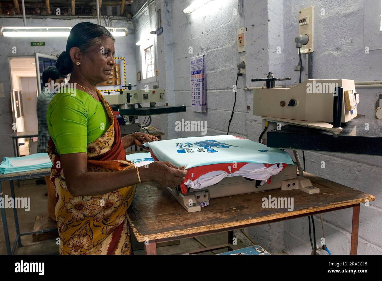 Manual fusing after printing in a garment industry, Tiruppur Tirupur