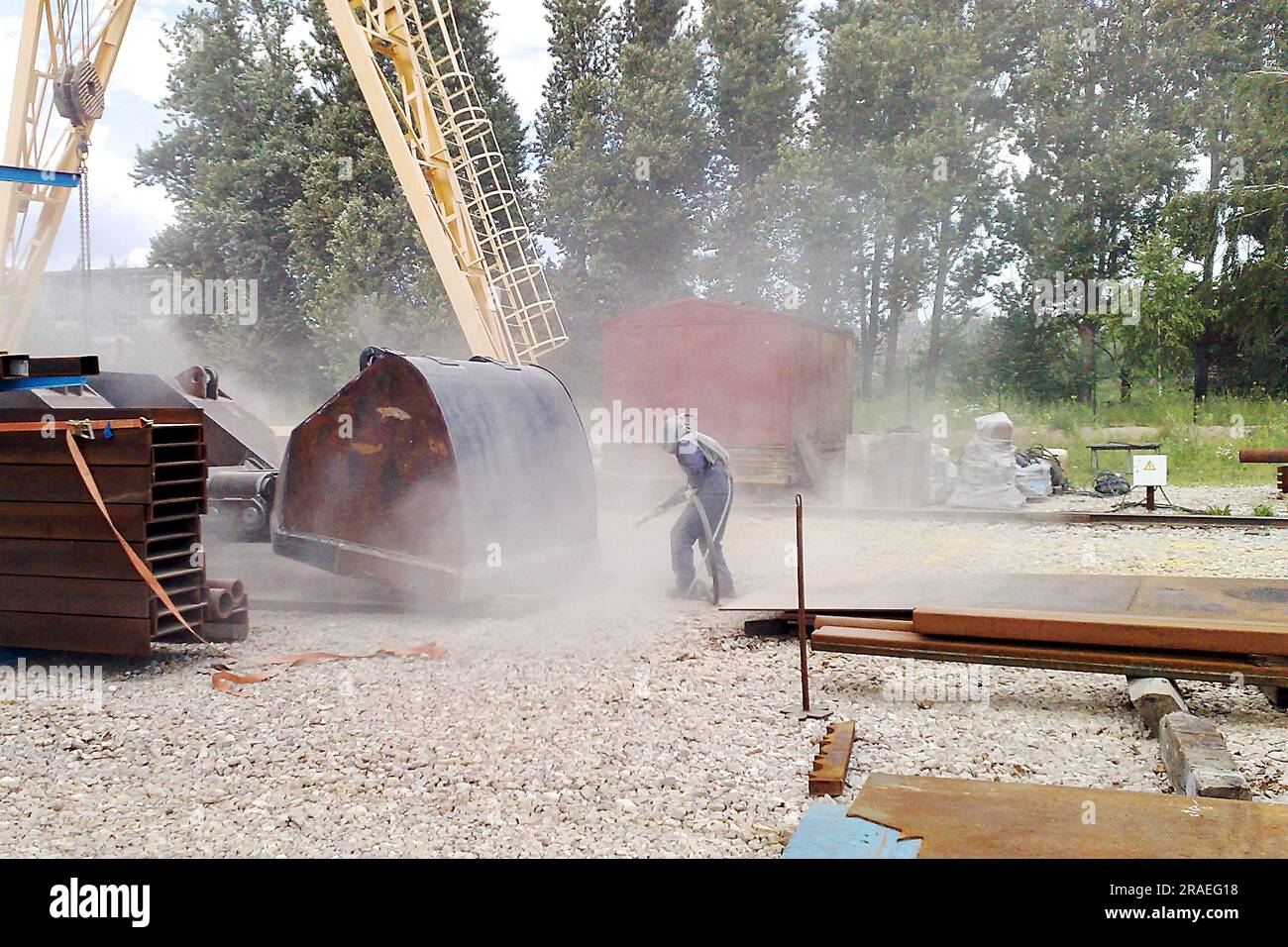 Sandblasting process. Cleaning the metal construction surface from rust