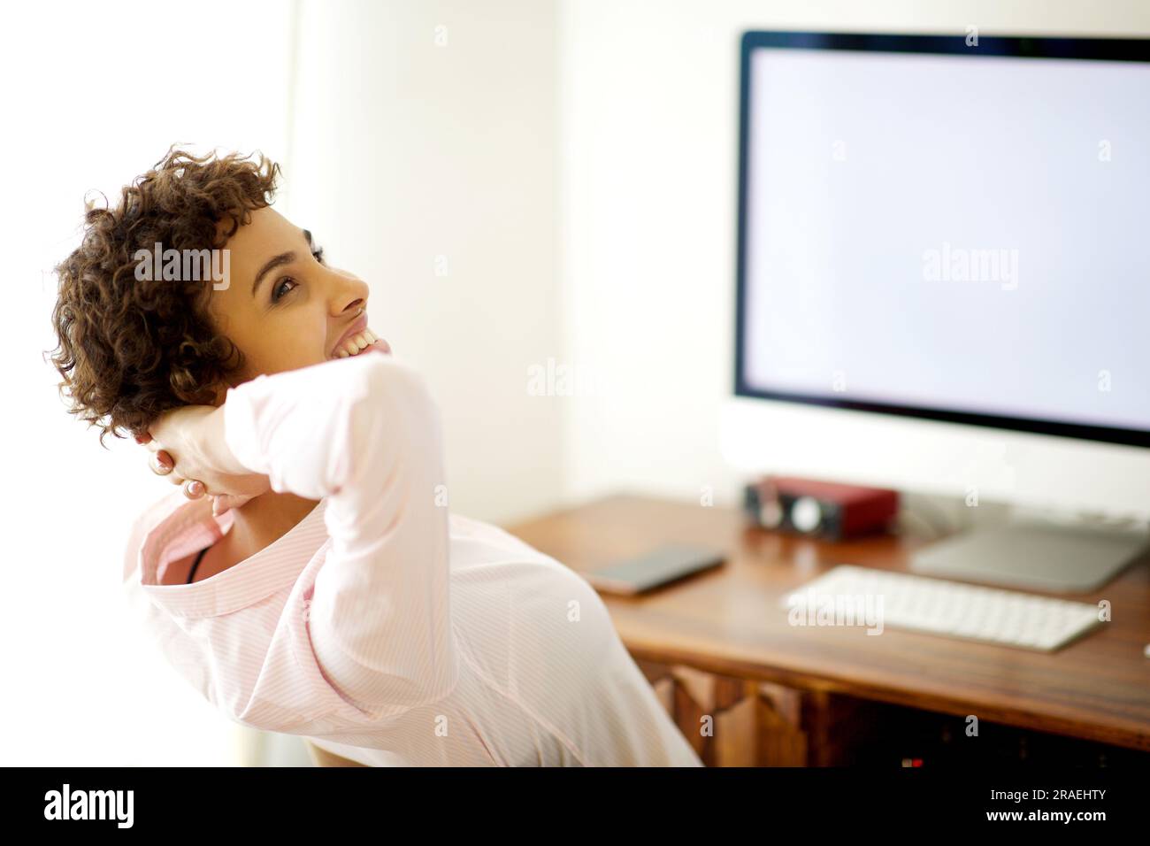 Girl Behind A Computer Black woman behind desk happy hi-res stock photography and images - Alamy