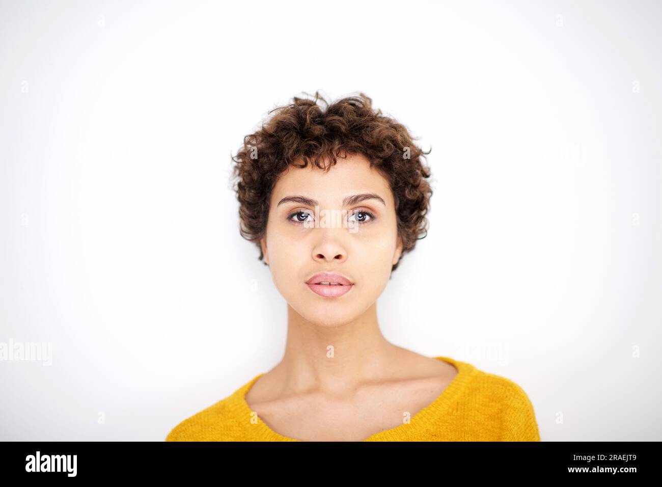 Close up front portrait of beautiful young african american woman by ...