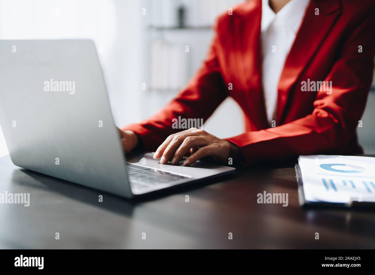 Beautiful young teen asian businesswoman using laptop computer and ...