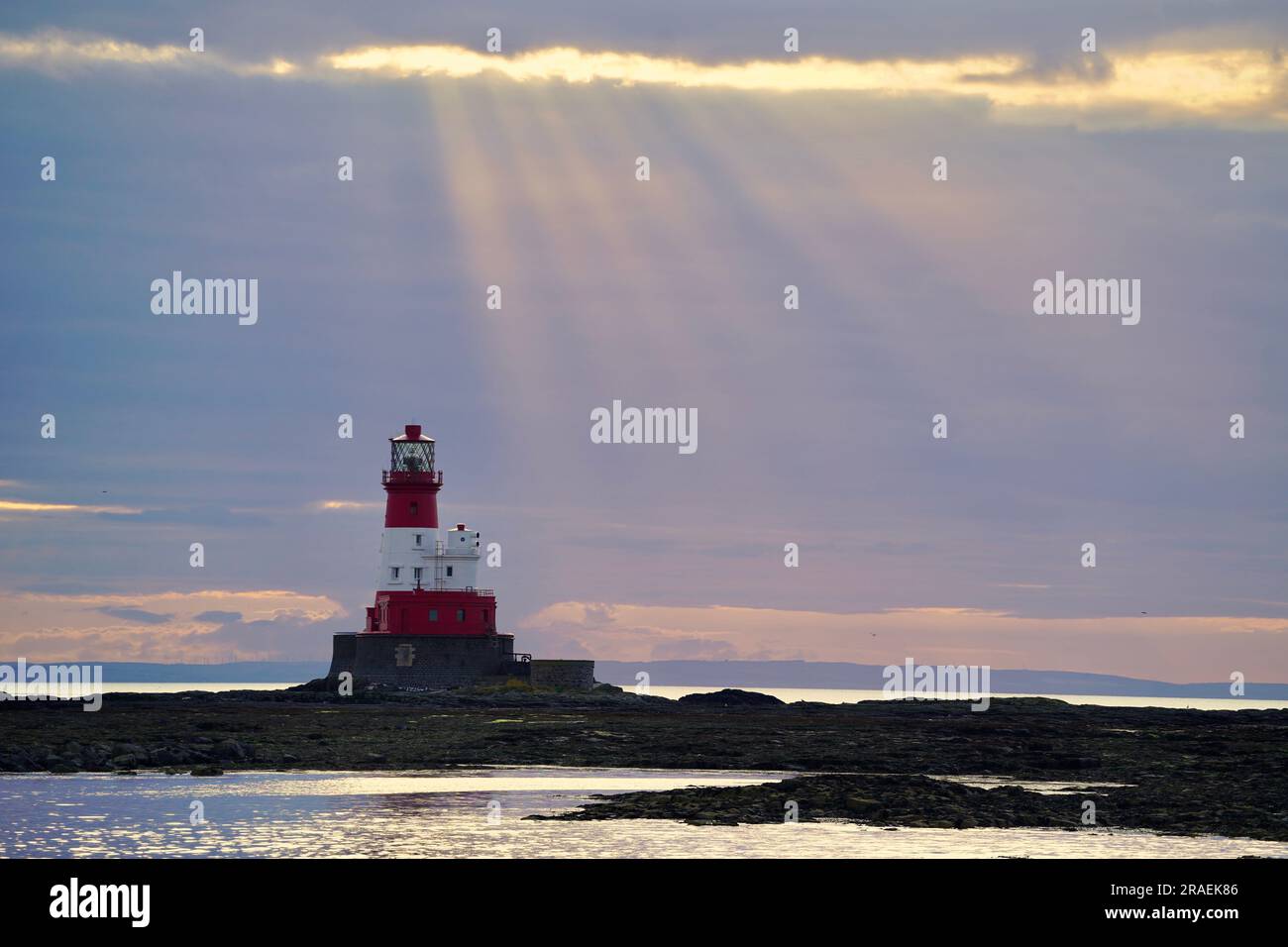Longstone Lighthouse at sunset Stock Photo