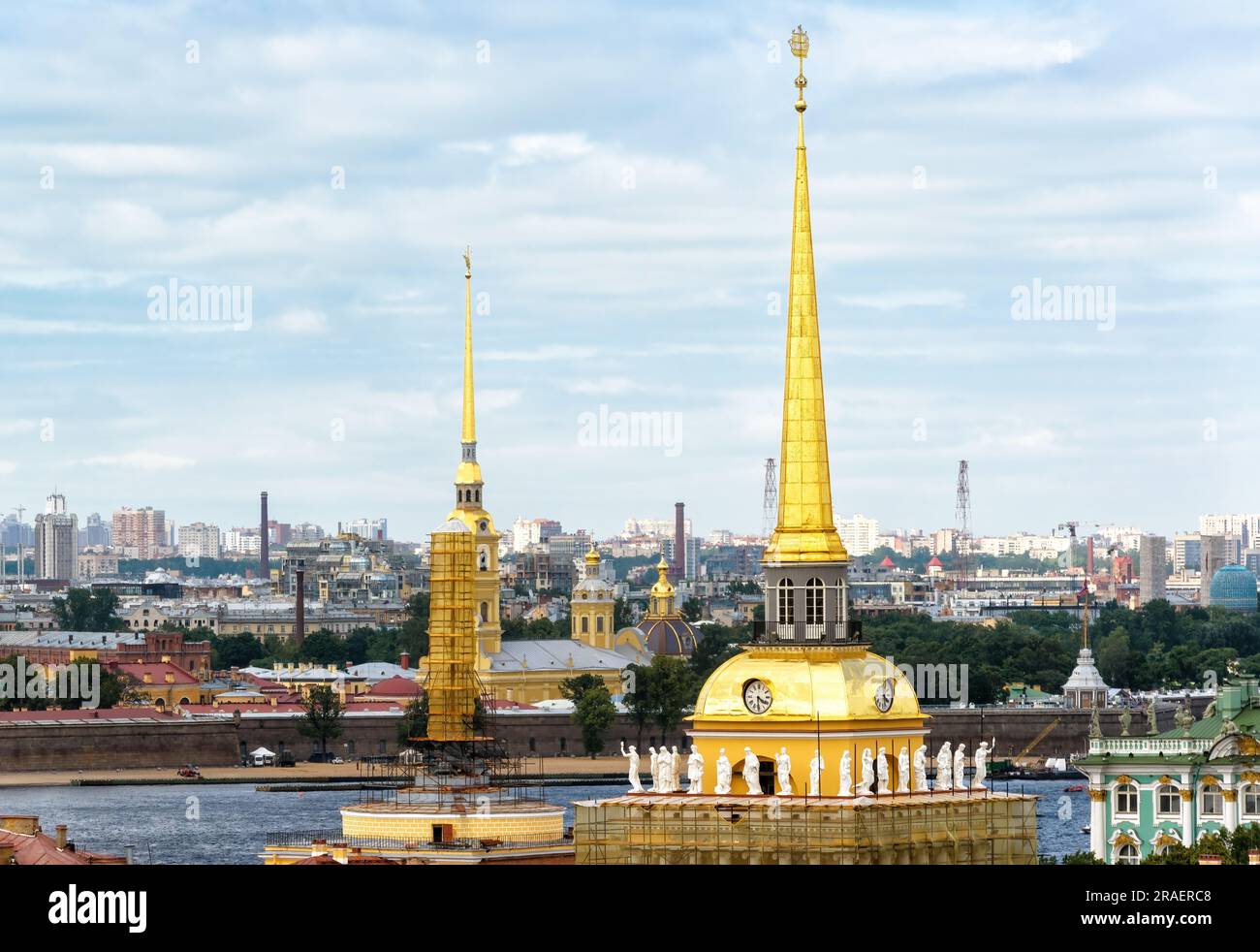 Golden spires of Admiralty and Peter and Paul Cathedral, Saint Petersburg, Russia. Skyline of St Petersburg in summer morning. Historical buildings on Stock Photo