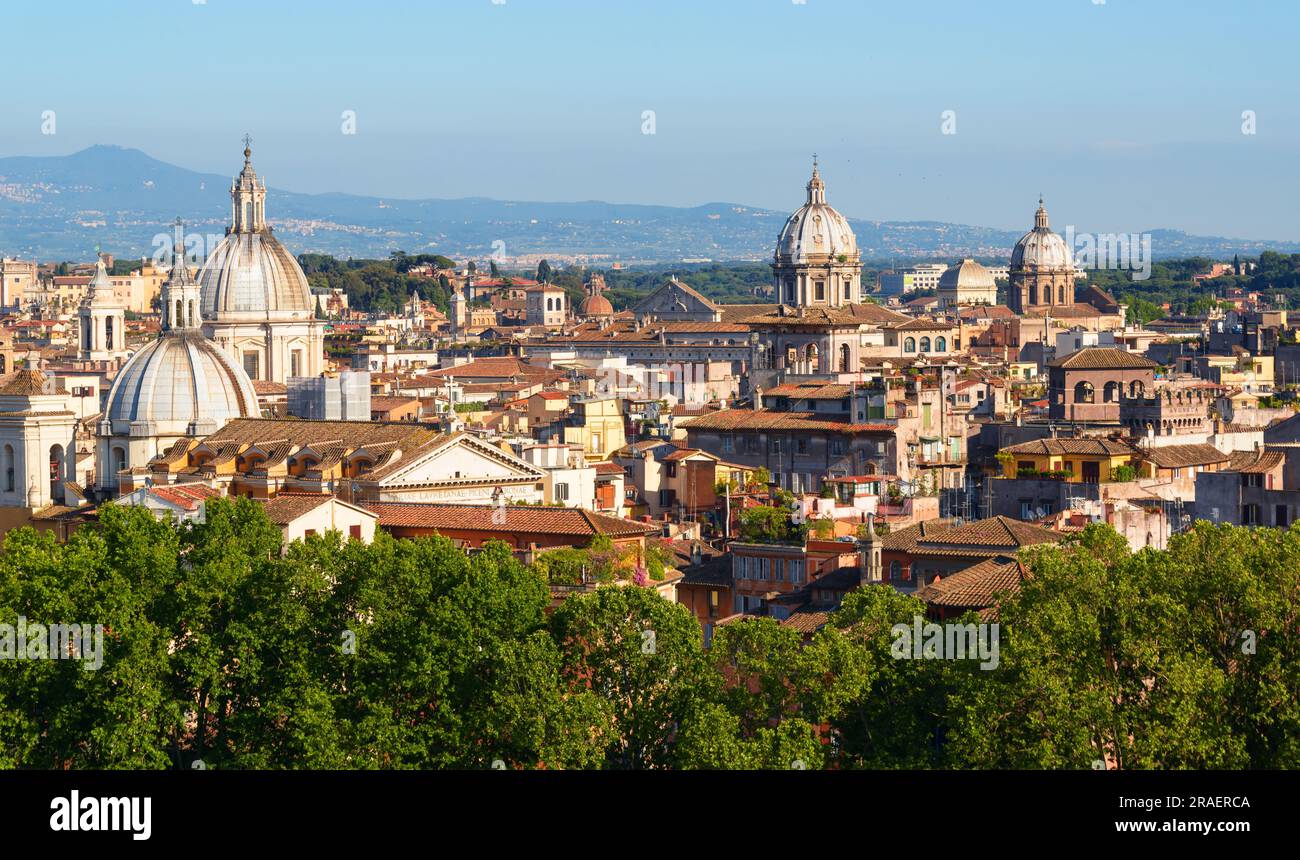 Rome skyline, Italy, Europe. Scenic view of Rome buildings on mountains background. Beautiful cityscape of Rome in summer. Nice landscape of old Roma Stock Photo