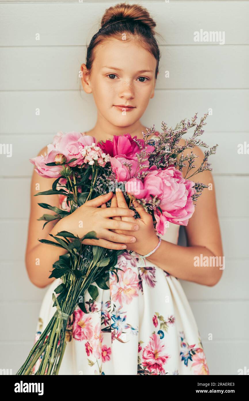 Summer portrait of adorable little girl wearing beautiful occasional
