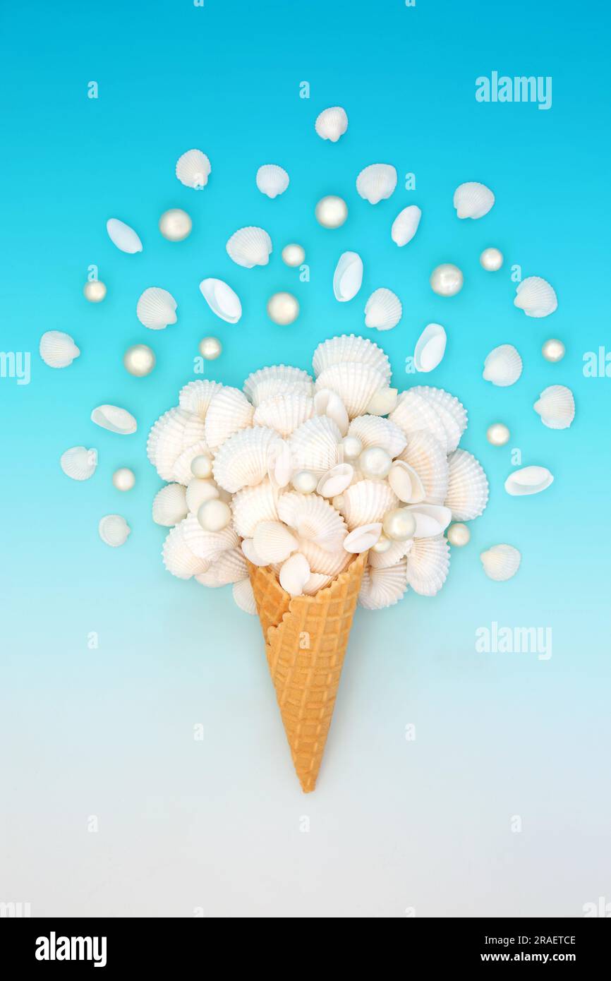 Surreal seashell and pearl summer ice cream cone on gradient blue white background. Nature food fun  bouquet abstract art composition. Stock Photo