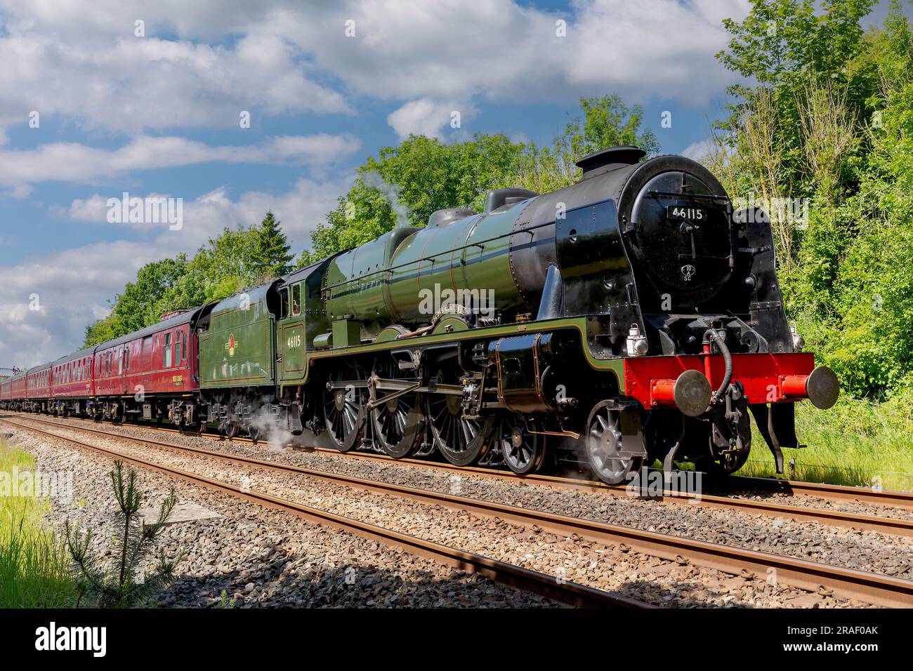 Heritage steam train LMS Royal Scot Class 6115 Scots Guardsman seen running on the main Carlisle to Settle track. Stock Photo