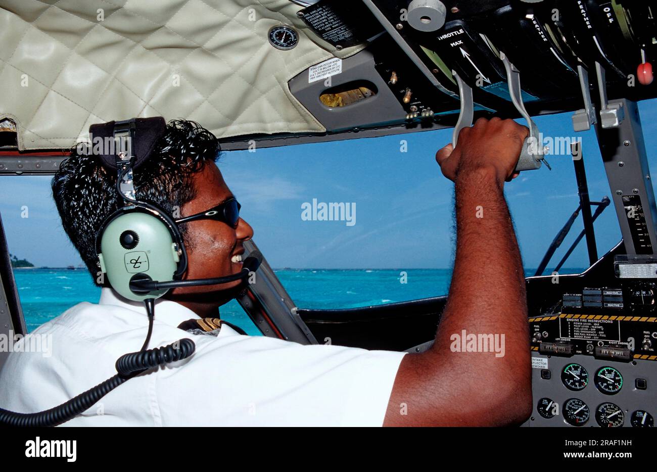 Pilot in seaplane, Meemu Atoll, water taxi, Maldives Stock Photo