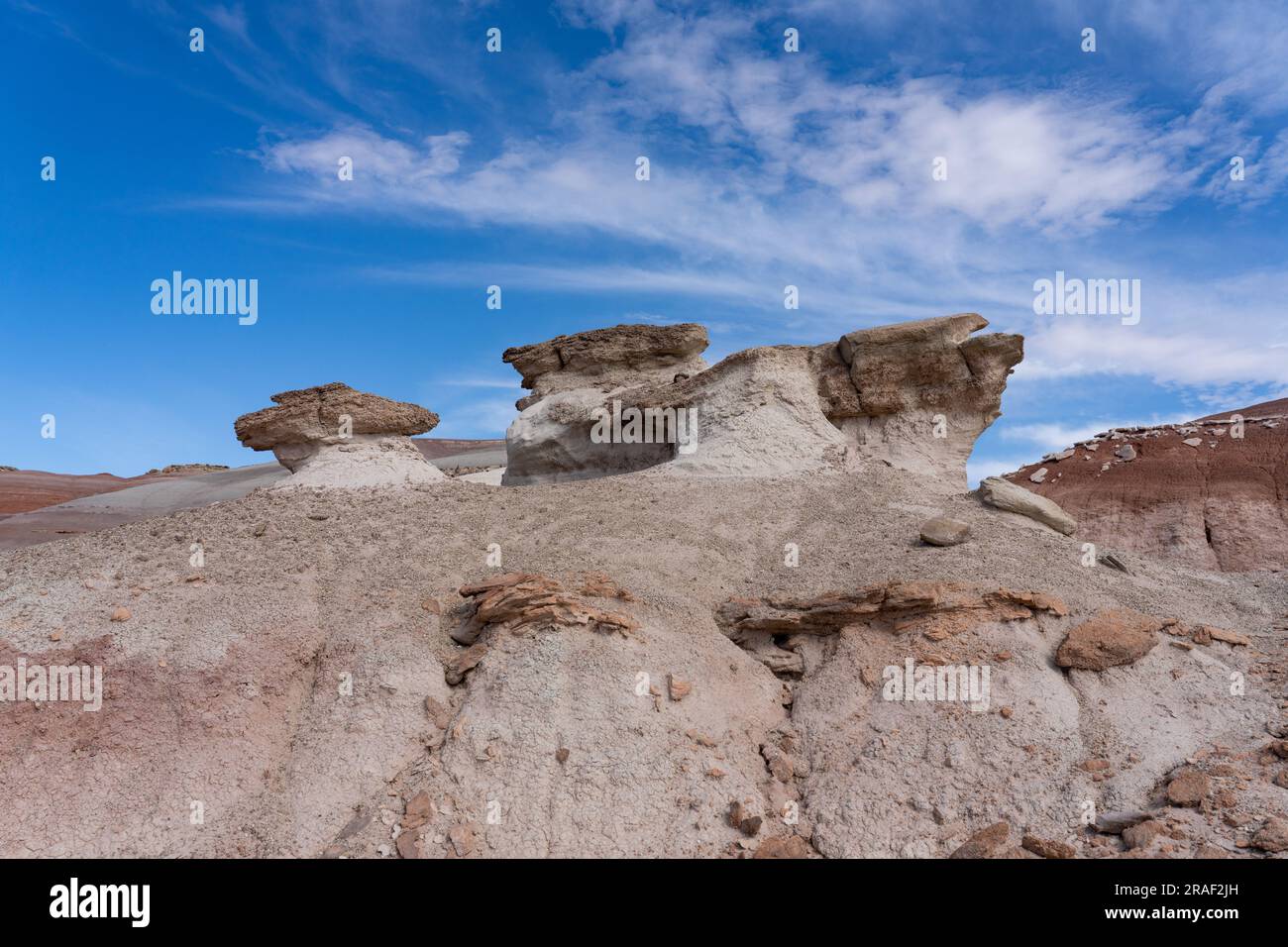 Stone caprocks on clay hoodoos in the bentonite hills of the Caineville ...