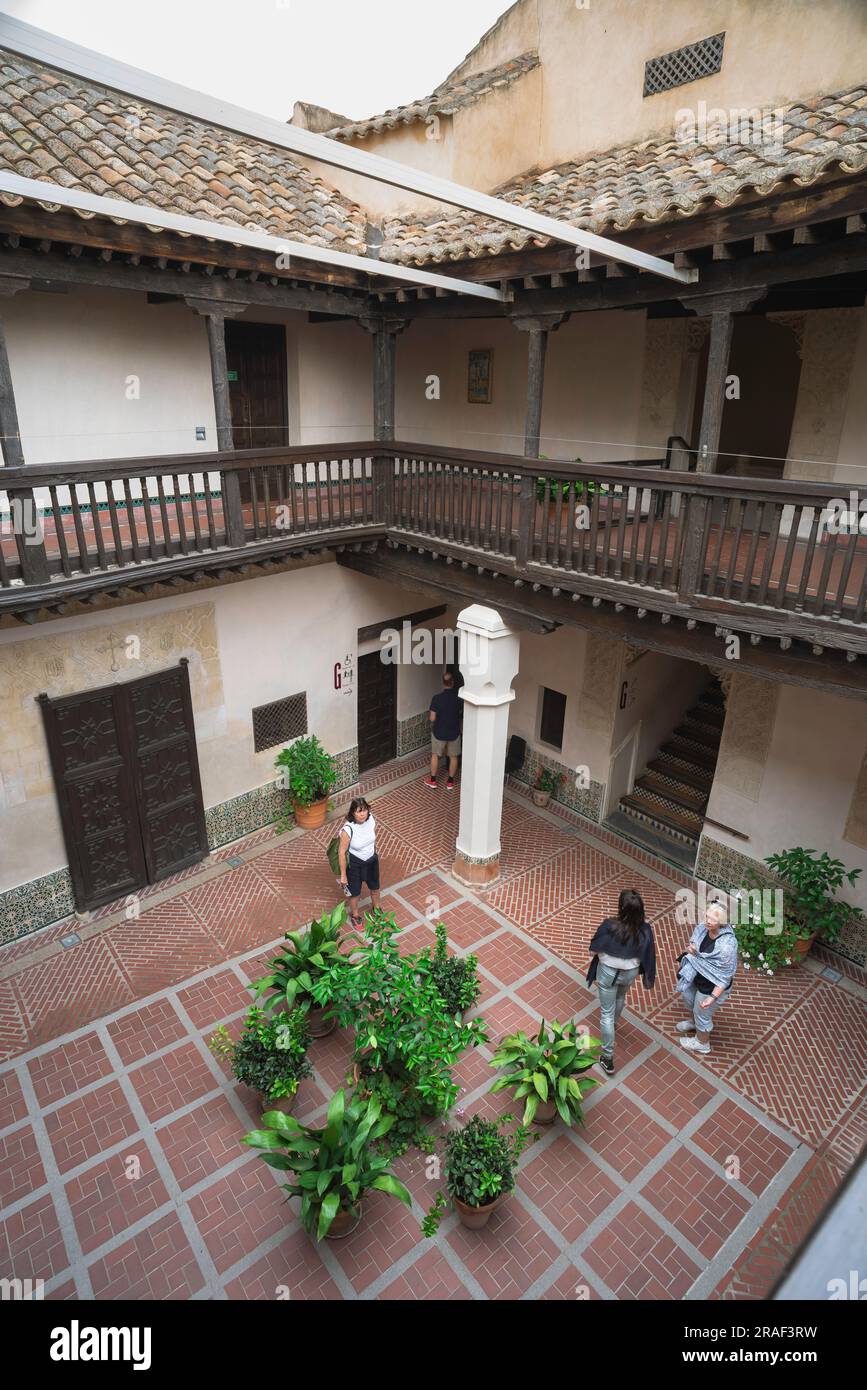 Toledo museum, view of tourists standing in the Patio Of The House inside the El Greco Museum (Museo del Greco) in Toledo, Spain Stock Photo