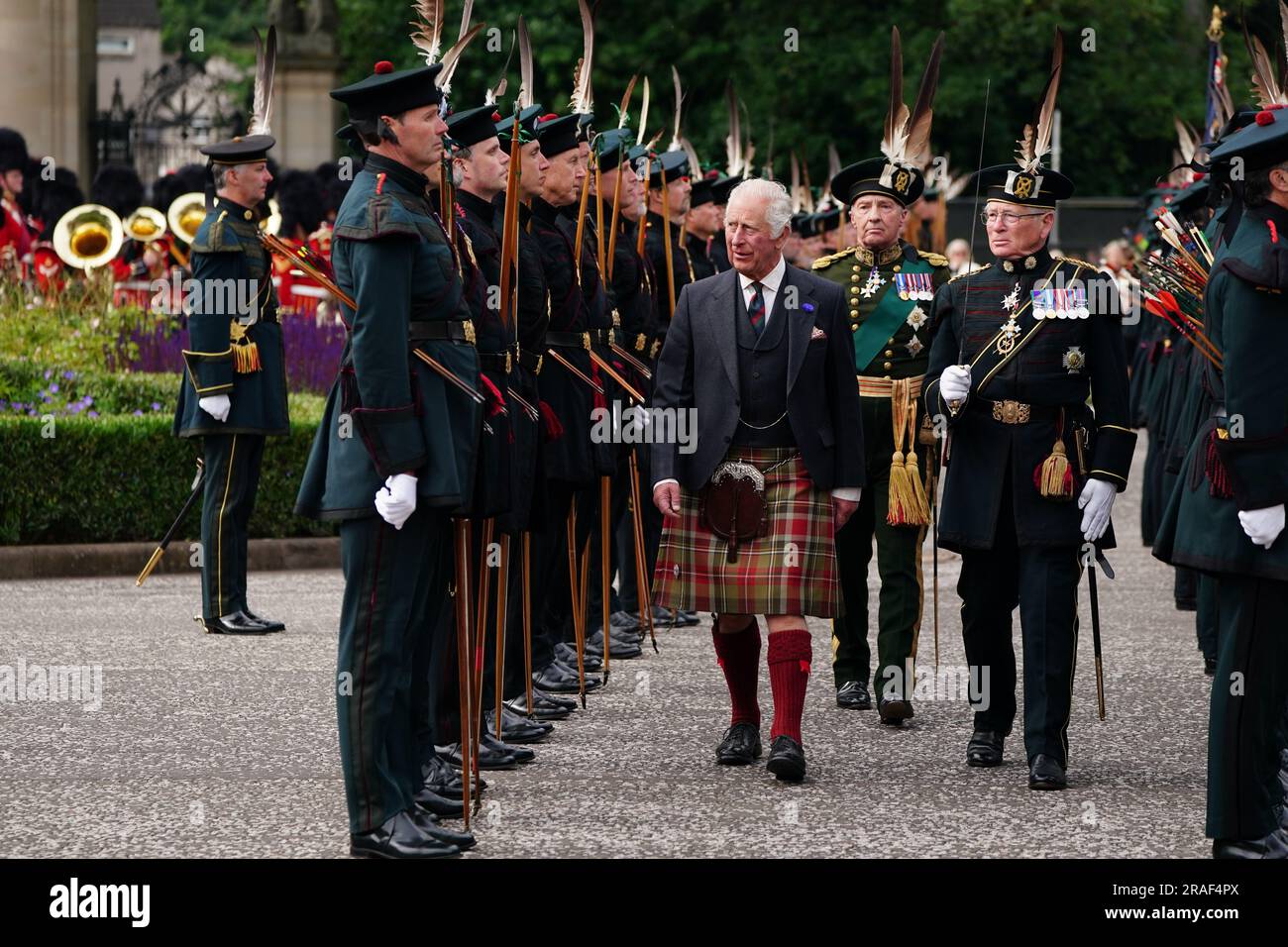 King charles iii inspects the royal company of archers guard of honour