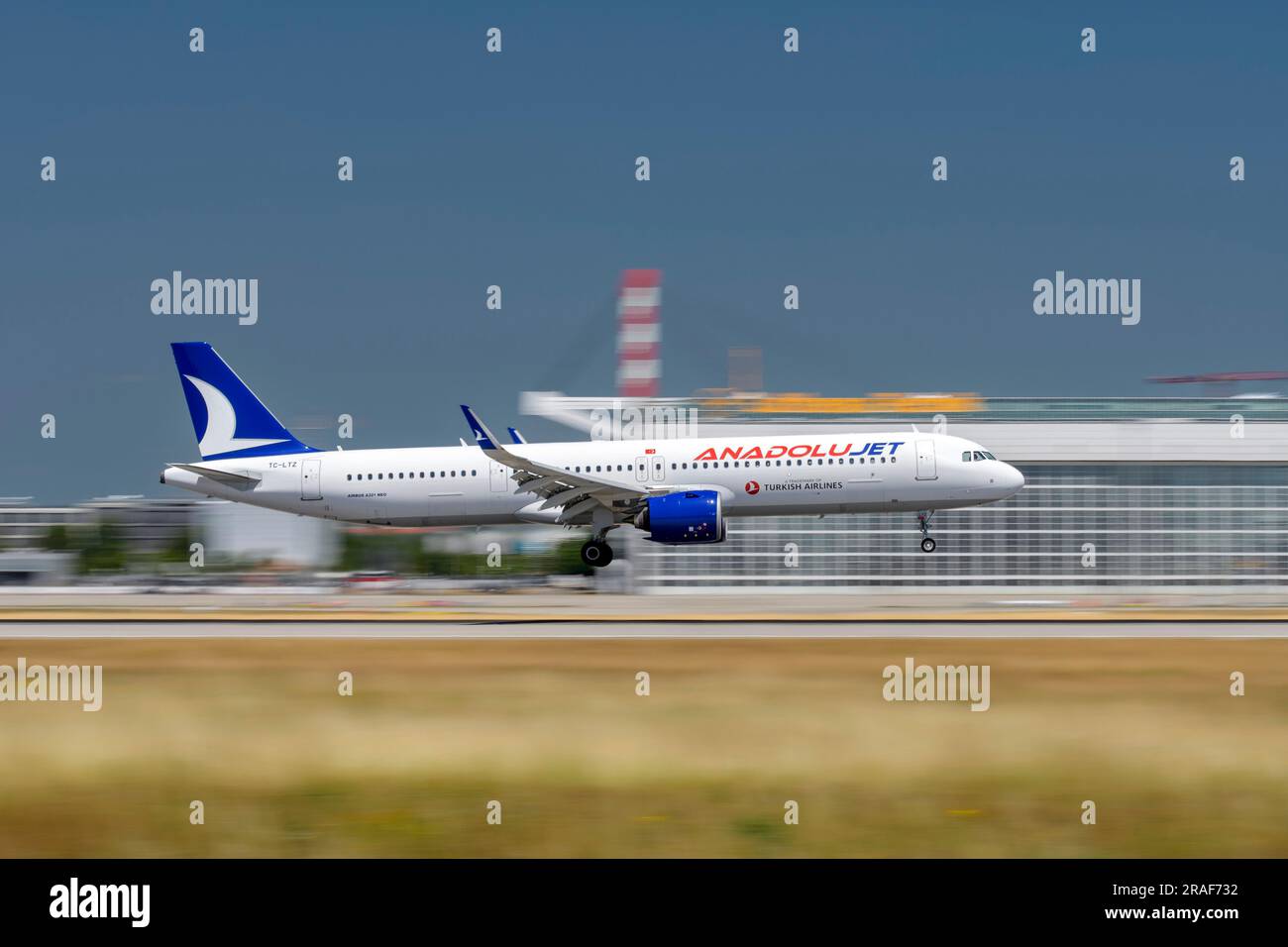Munich, Germany - June 29. 2023 : Anadolu Jet Airbus A321-271NX with the aircraft registration TC-LTZ during landing to the southern runway 26L of the Stock Photo