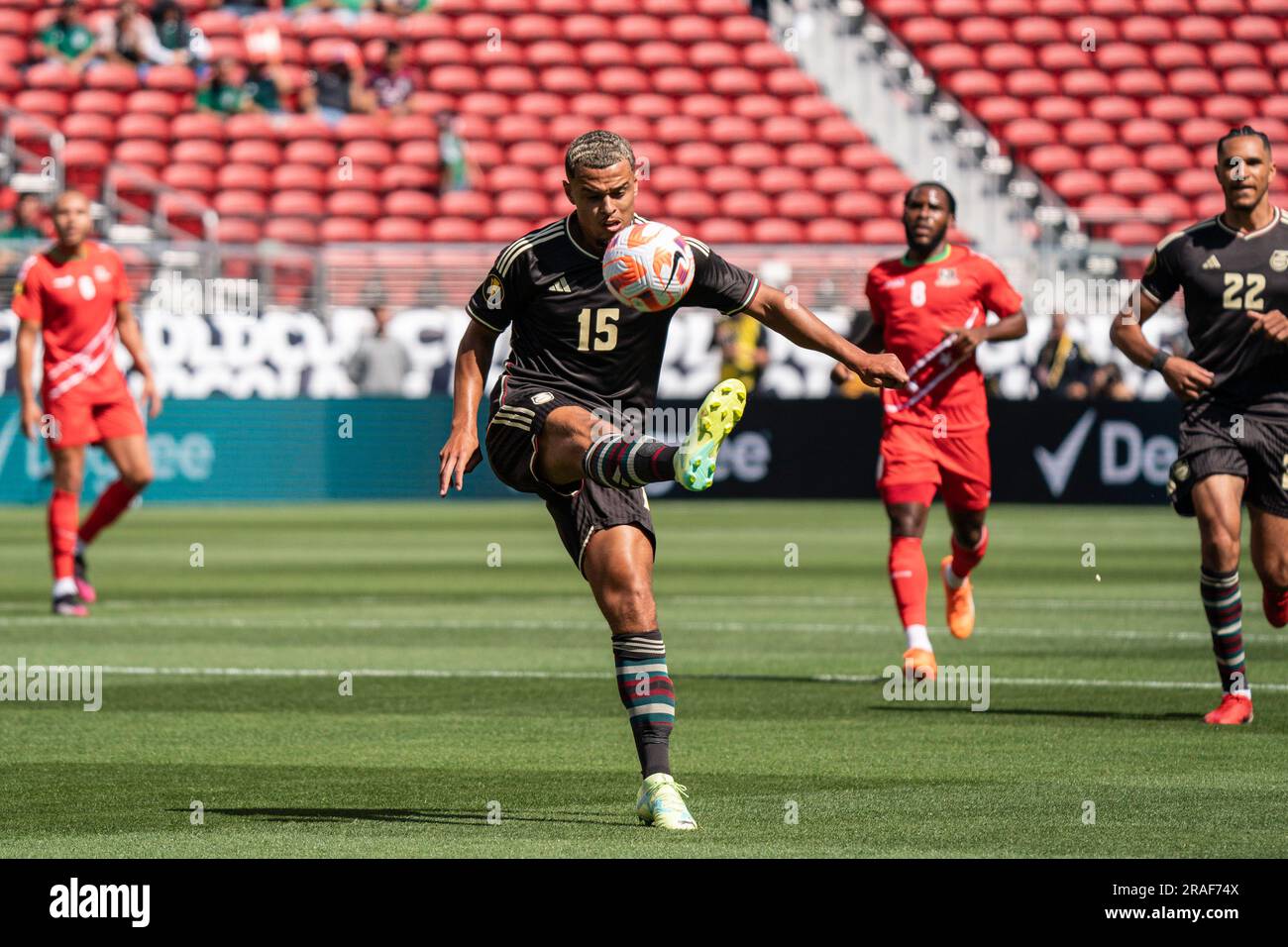Jamaica midfielder Joel Latibeaudiere (15) clears the ball during a Gold Cup match against Saint Kitts and Nevis, Sunday, July 2, 2023, at Levi’s Stad Stock Photo