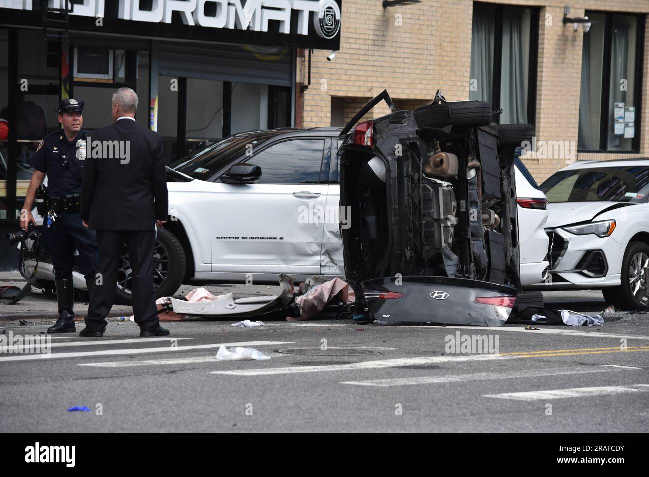 Authorities seen investigating the crime scene. Two people were killed