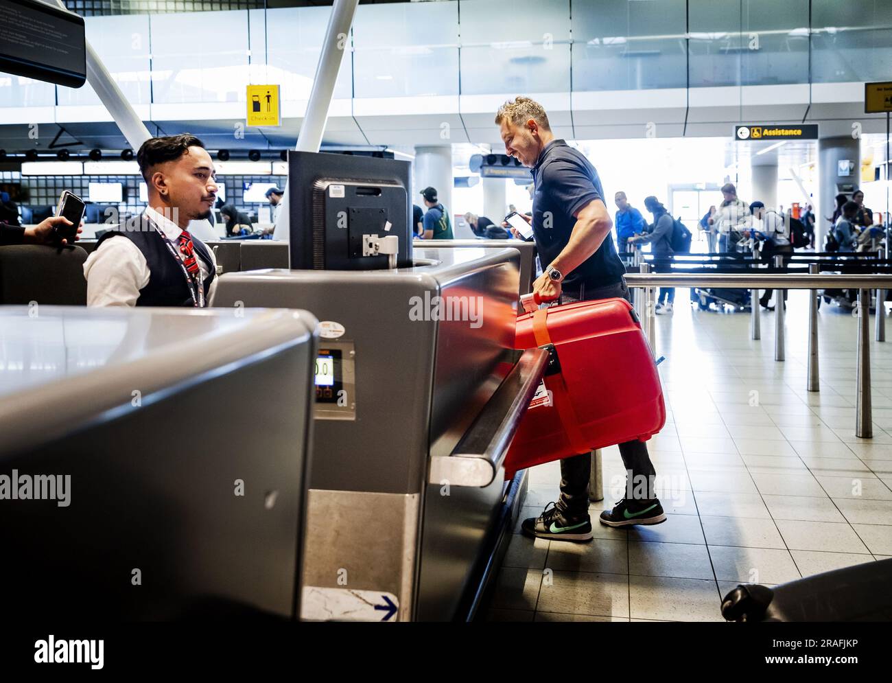 SCHIPHOL Collected baggage is checked in by a baggage collection
