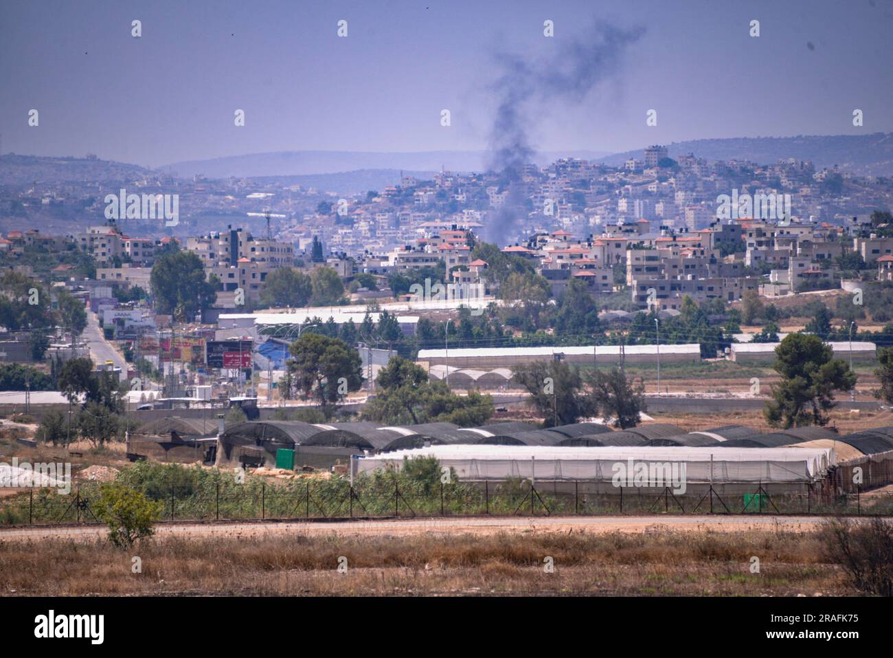 Jenin, Palestine. 03rd July, 2023. Smoke rise above the Palestinian city of Jenin during an IDF (Israel Defense Forces) raid using foot soldiers and air strikes. Credit: SOPA Images Limited/Alamy Live News Stock Photo