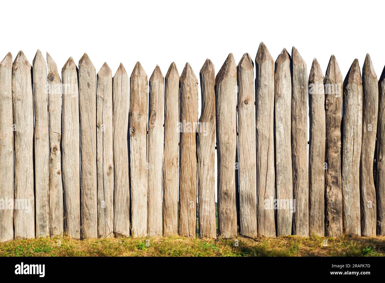 Wooden fence from logs isolated on white background Stock Photo - Alamy