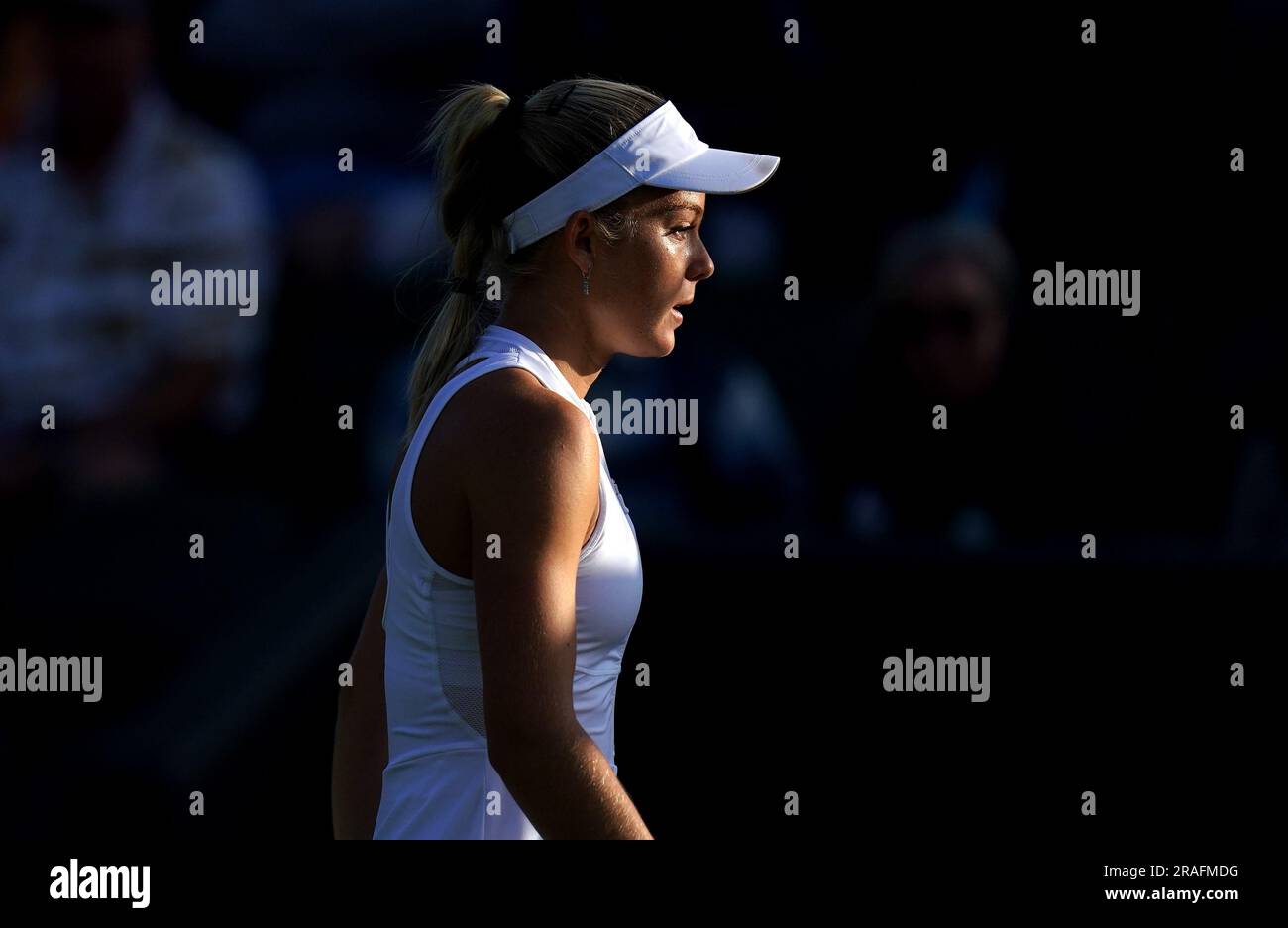 Katie Swan appears dejected following defeat to Belinda Bencic on day