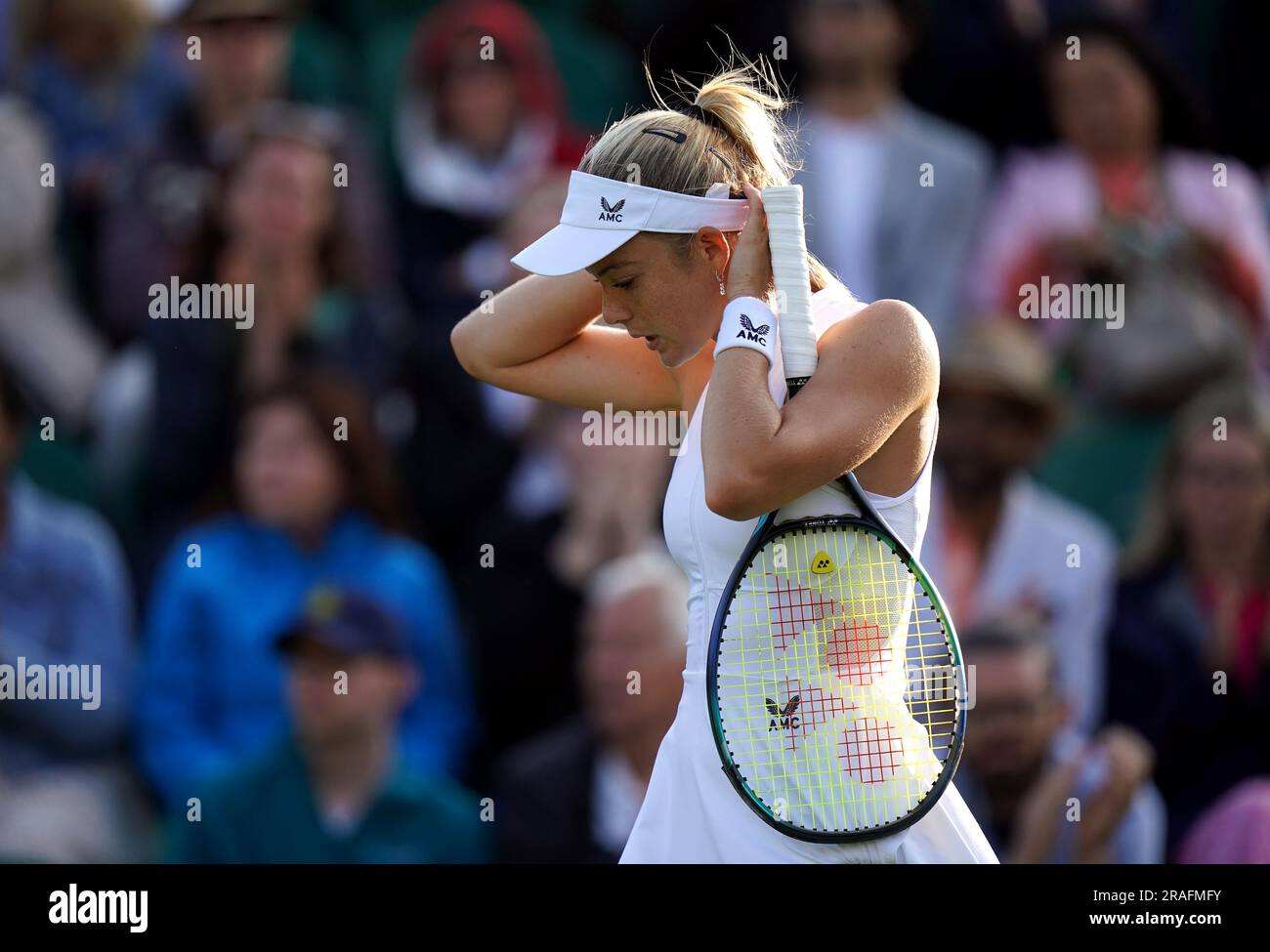 Katie Swan appears dejected following defeat to Belinda Bencic on day