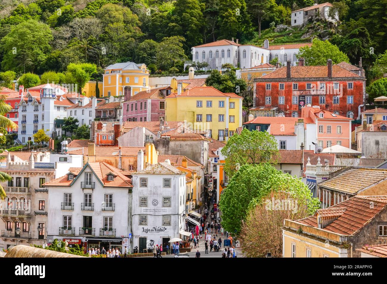 The historic town and central square of Sao Martinho, from the gardens of the Sintra National Palace in Sintra, Portugal. The Romanticist architectural and fairytale palaces draws tourists from around the world. Stock Photo