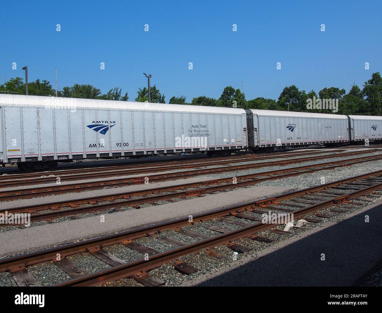 Amtrak AutoTrain car containing automobiles being positioned upon