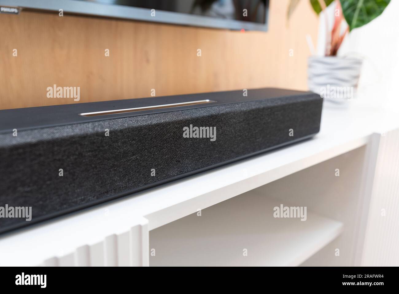 Soundbar in a modern home. Listening to music and watching movies Stock