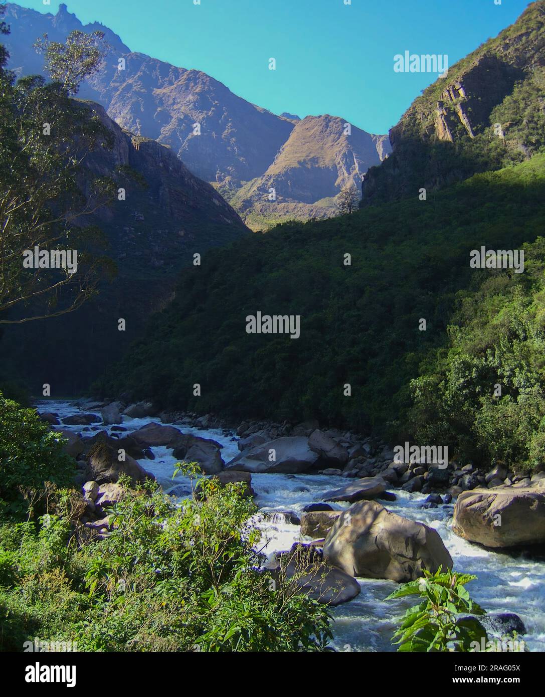 Urubamba River as seen from the Train going towards Machu Picchu in Peru. Stock Photo