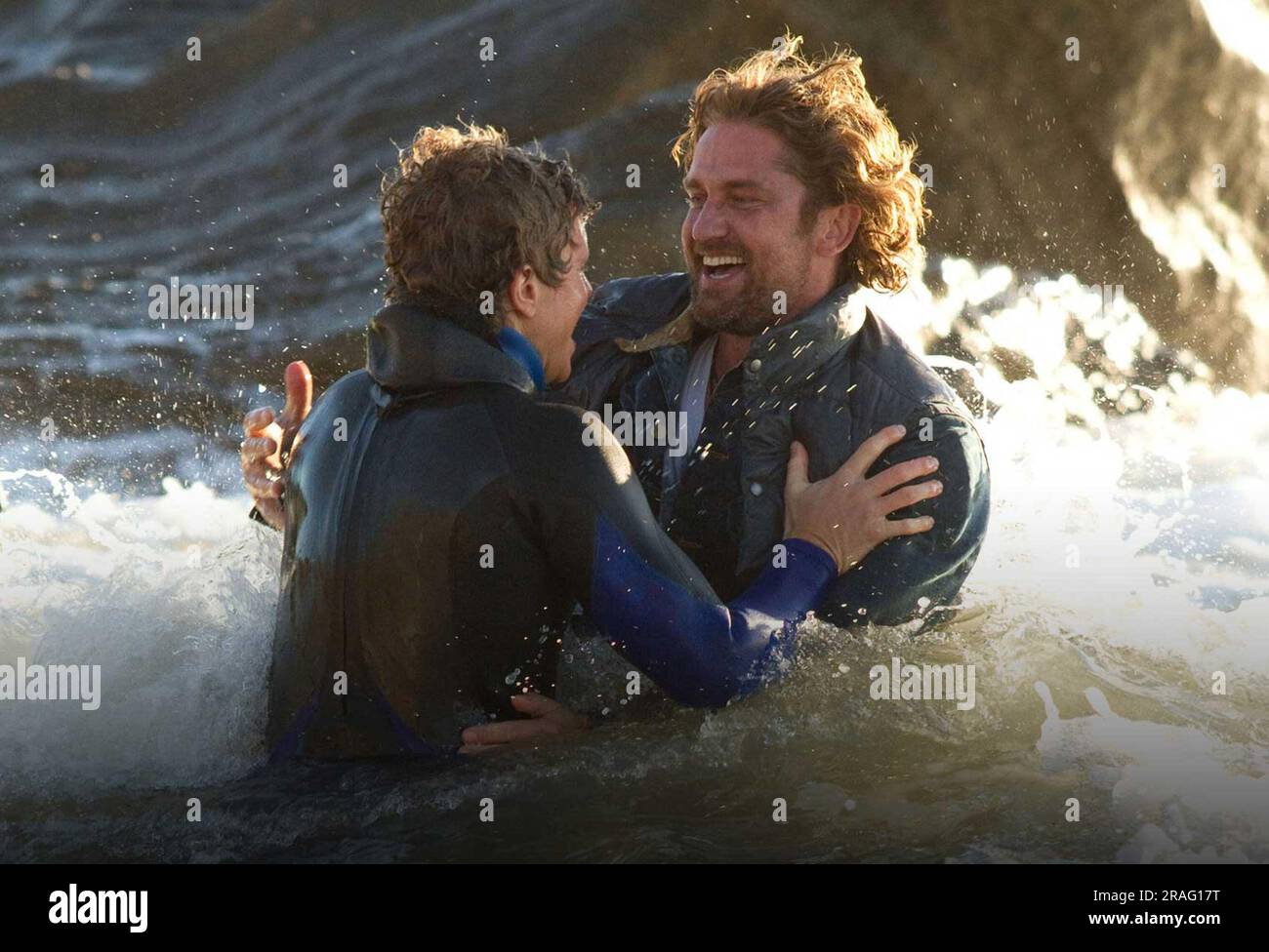 Los Angeles. CA. USA. Gerard Butler as Frosty Hesson and Jonny Weston as  Jay Moriarity in the ©Twentieth Century Fox film Chasing Mavericks (2012). The  film is about surfing, involving the search