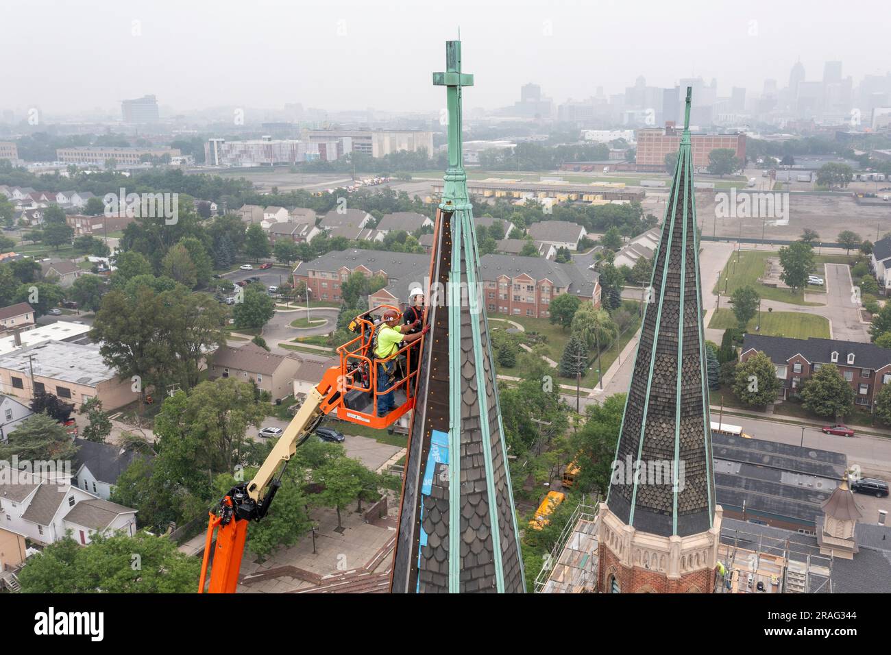 Detroit, Michigan - Workers repair the towers of the Basilica of Ste ...