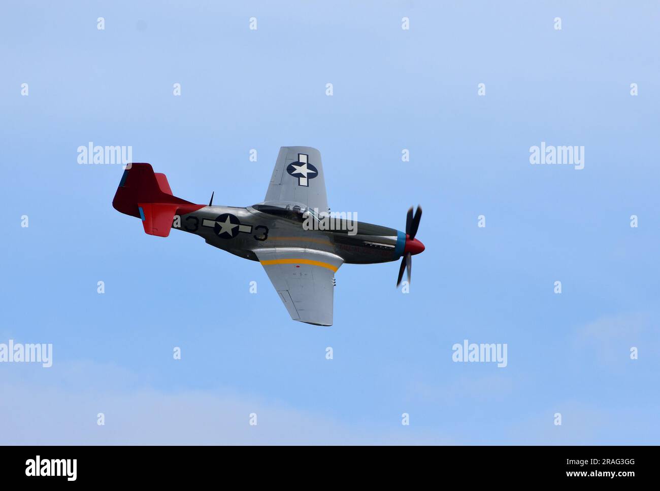 Vintage P51 Mustang 'Tall in the Saddle' A33 Red Tail  in flight. Stock Photo