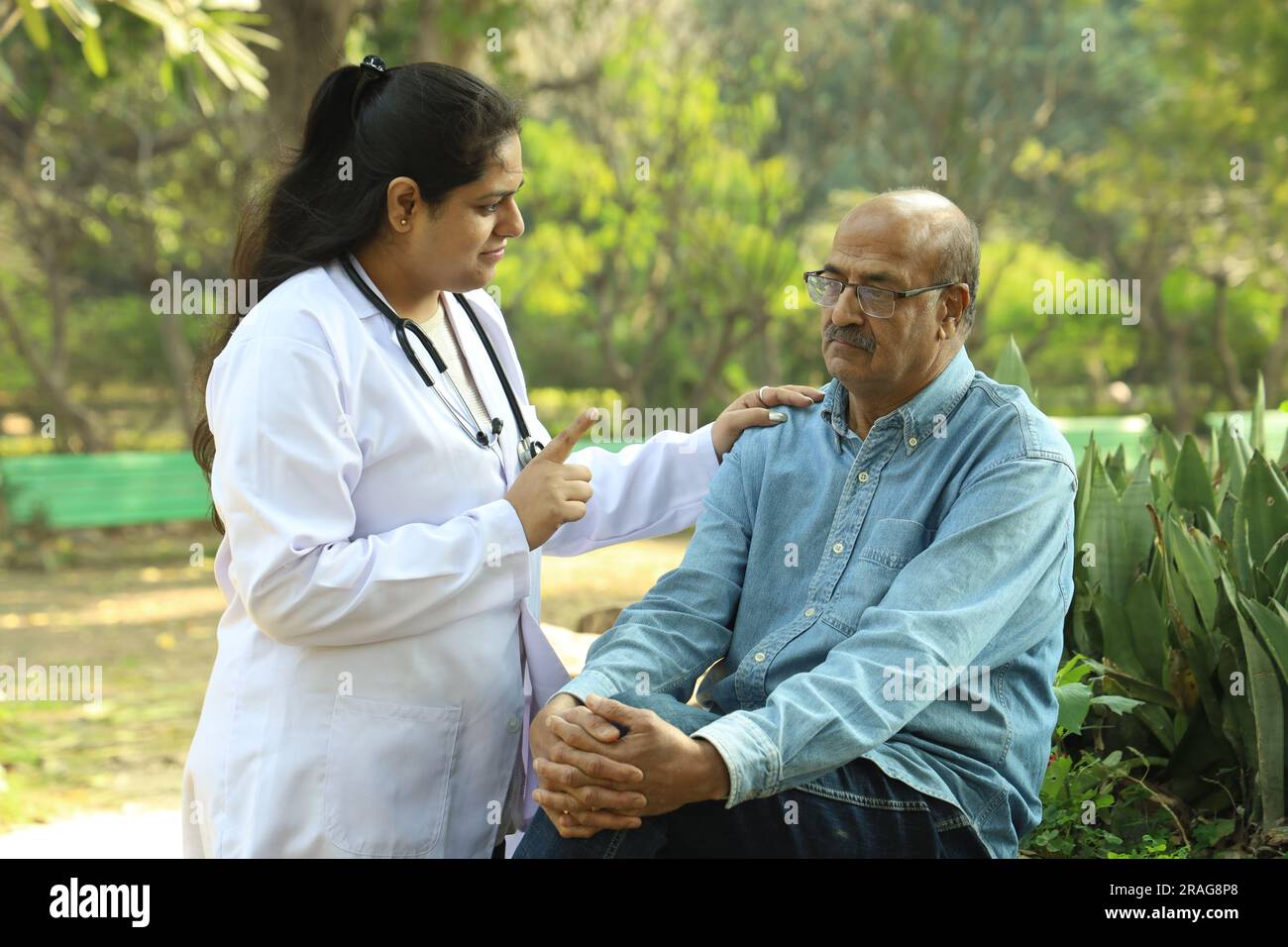 Indian doctor with female patient hi-res stock photography and images ...