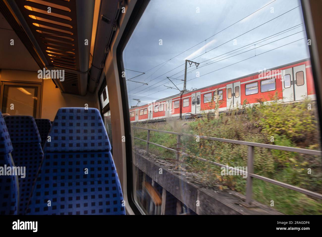Picture of a typical seat from a European german train, empty, ready for a suburban service in Cologne, typical from Europe, in a modern regional EMU Stock Photo