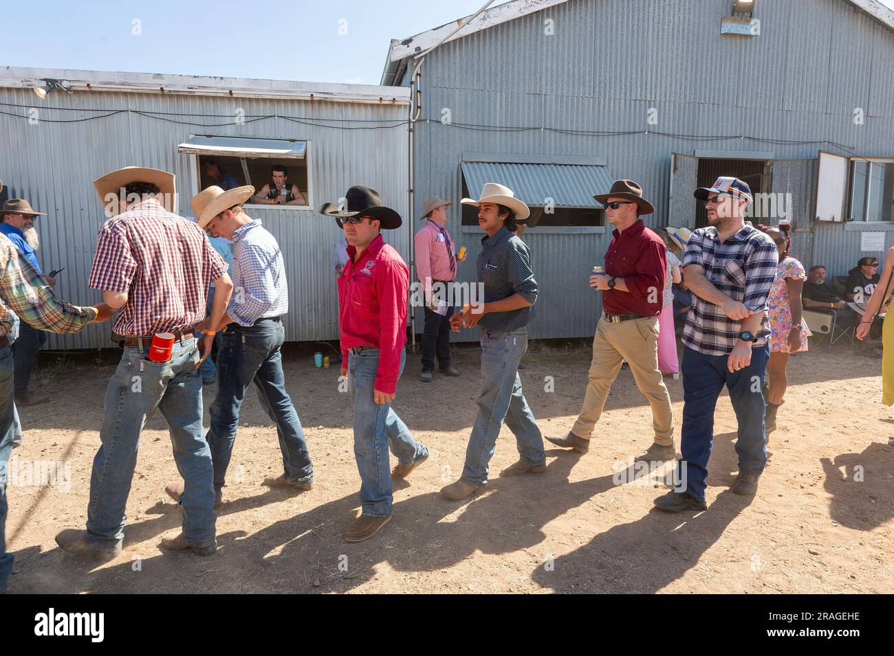 Group of young men wearing cowboy hats during the ABC Bush Races at Brunette Downs, a traditional Outback event, Northern Territory, NT, Australia Stock Photo