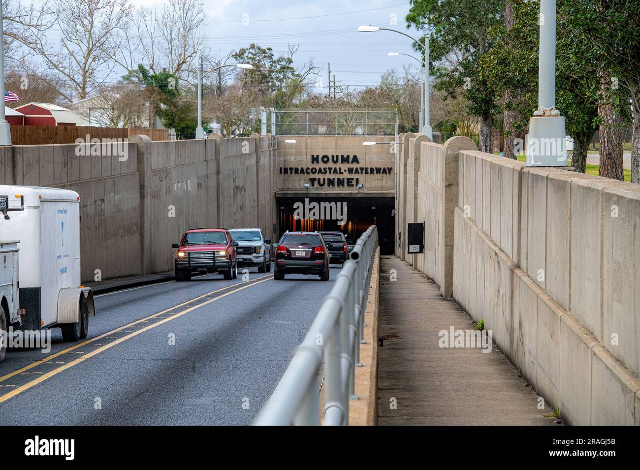 Vehicles entering the Houma Intercoastal Waterway Tunnel Stock Photo