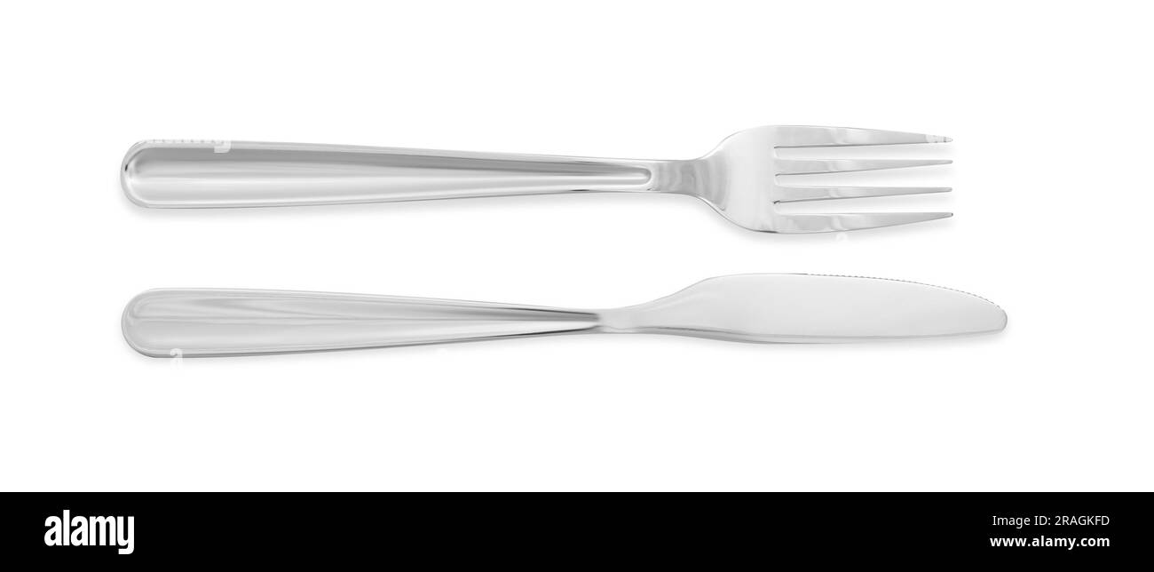 Knife and fork isolated on white, top view. Stylish shiny cutlery set ...