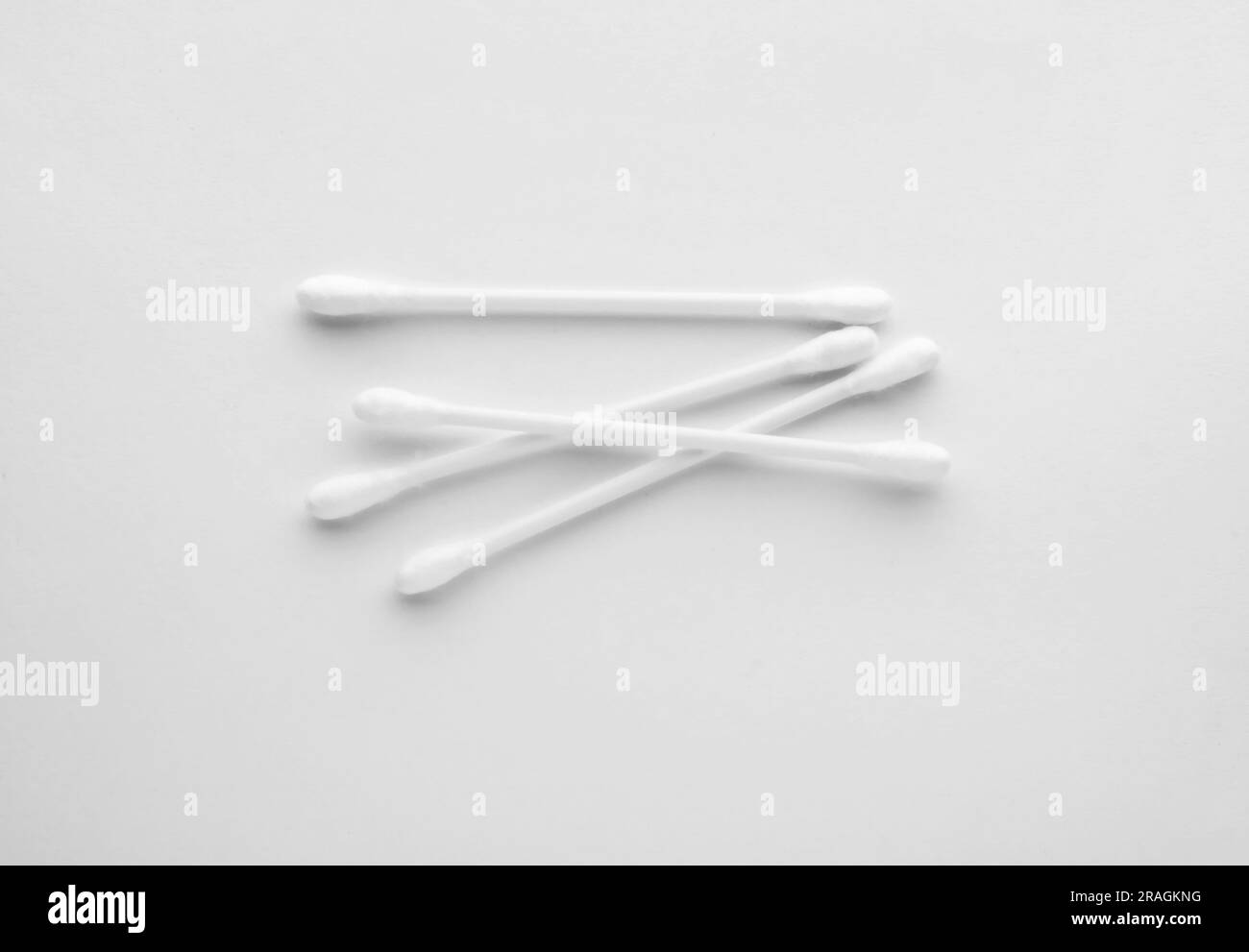 Clean cotton buds isolated on white, top view Stock Photo Alamy