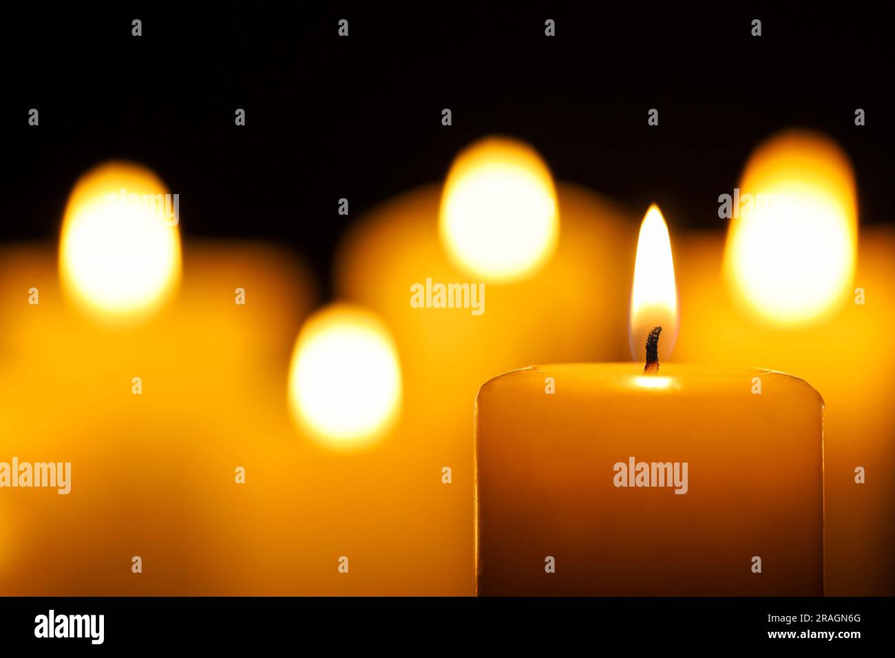 Burning candle on black background, closeup. Space for text Stock Photo ...